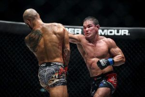 Adrian Pang punches Roger Huerta