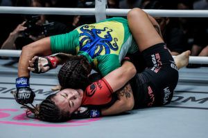 Michelle Nicolini ground and pounds Angela Lee