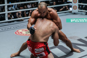 Eddie Alvarez wrestles with Eduard Folayang