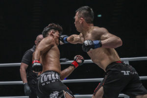 Amarsanaa Tsogookhuu punches Shannon Wiratchai