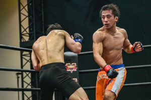 Kodai Murata punches Min Jong Song 300x200