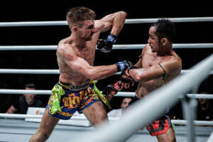 Jonathan Haggerty elbows Sam-A Gaiyanghadao at the Singapore Indoor Stadium