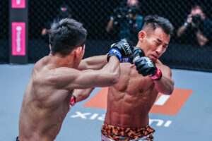 Tang Kai punches Ryogo Takahashi