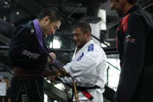 Chatri Sityodtong being awarded his BJJ brown belt by Alex Silva at Evolve MMA in 2021