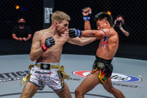 Jonathan Haggerty lands an uppercut against Mongkolpetch Petchyindee at the Singapore Indoor Stadium