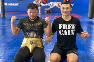 Former UFC flyweight and bantamweight championHenry Cejudo poses with UFC featherweight title contender Chan Sun Jung at Fight Ready in Arizona