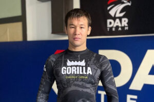 UFC welterweight Shavkat Rakhmonov strikes a pose at his gym in Kazakhstan