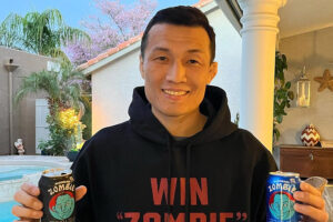 Chan Sun Jung, better known as The Korean Zombie, poses with a new range of branded energy drinks he is launching in South Korea