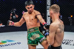 Petchmorakot Petchyindee kicks Jimmy Vienot during their featherweight Muay Thai title fight at ONE 157 in Singapore